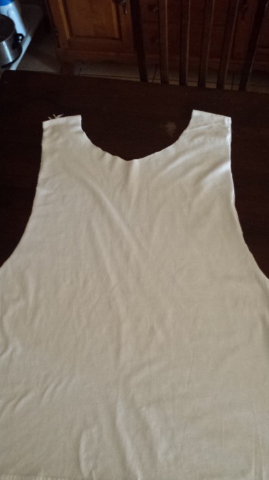 How to cut a t-shirt into a tank top.